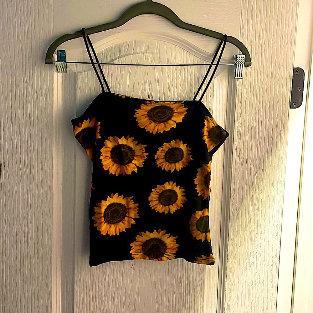 Nice tank/summer top. Worn 3-4 times. Nice quality.